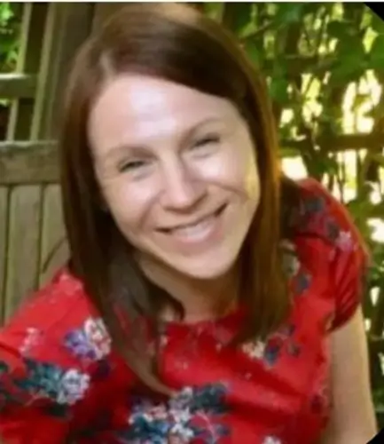 Karen Mitchell, smiling, a client who provided a testimonial about her coaching experience with Sam.